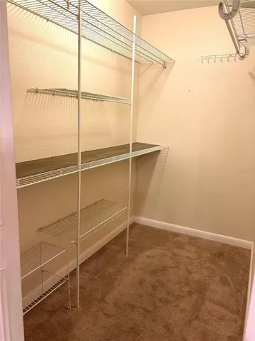Primary walk in closet.