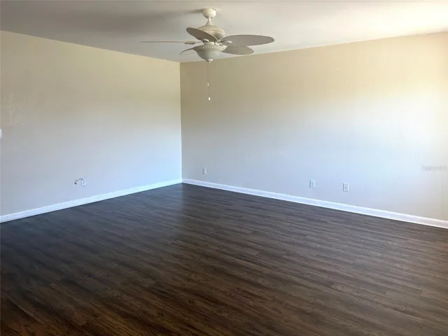 Living room from front entrance, laminate flooring.