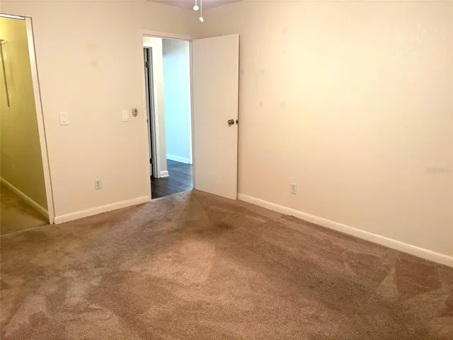 Primary bedroom toward hallway.