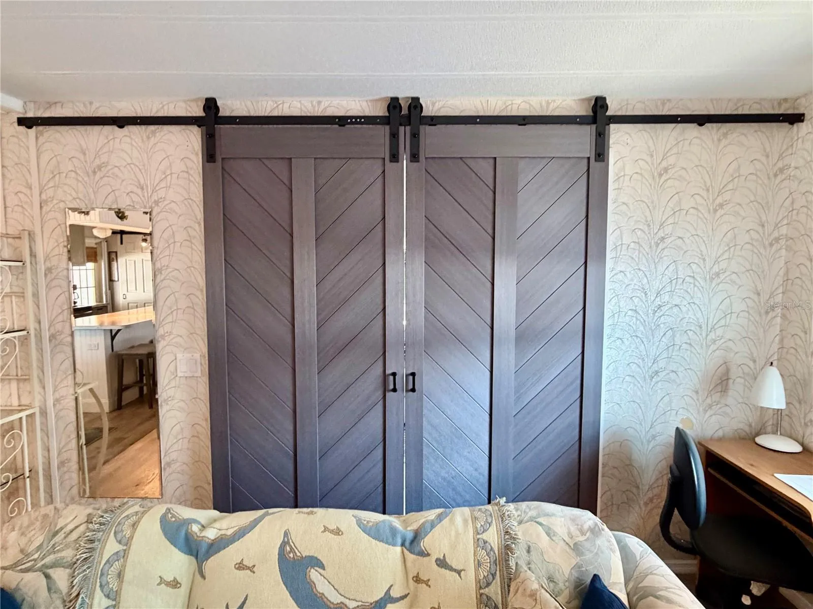 Barn doors close off the Bonus room (has been used as a 3rd bedroom)… or office.