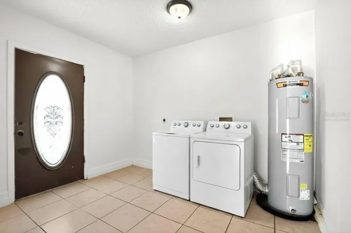 Disclaimer: Virtually staged - Washer and dryer not included.