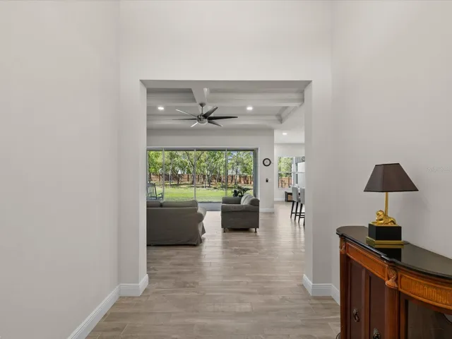 An open, elegant view from the foyer sets the tone for the home