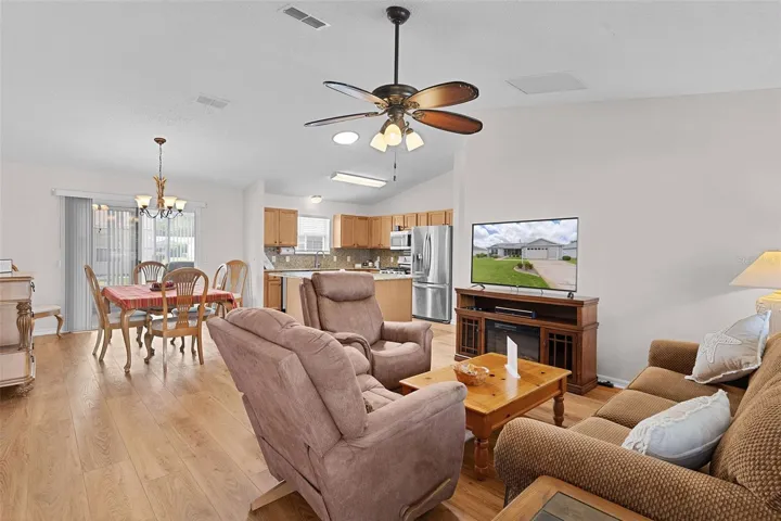 SPACIOUS LIVING ROOM, VIEW OF KITCHEN & DINING ROOM (OPEN CONCEPT)