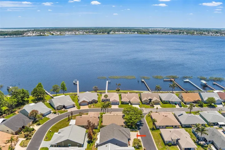 AERIAL VIEW OF HOME IN PROXIMITY TO LAKE HENRY