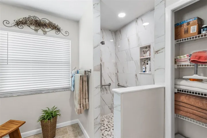 ENSUITE BATH WITH UPDATED WALK-IN SHOWER
