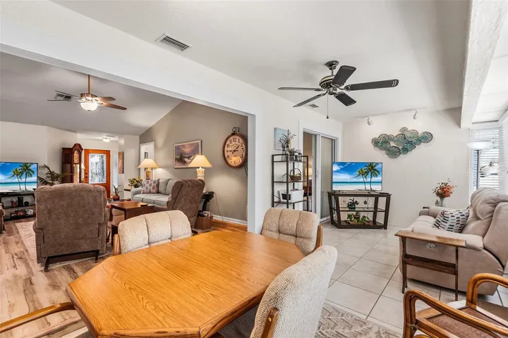 FLORIDA ROOM AND VIEW TOWARDS LIVING/GREATROOM