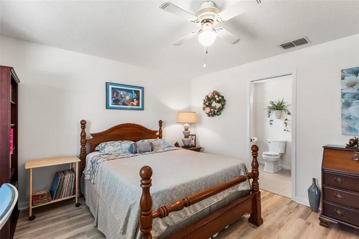 SECOND BEDROOM WITH VIEW TOWARDS EN-SUITE BATHROOM