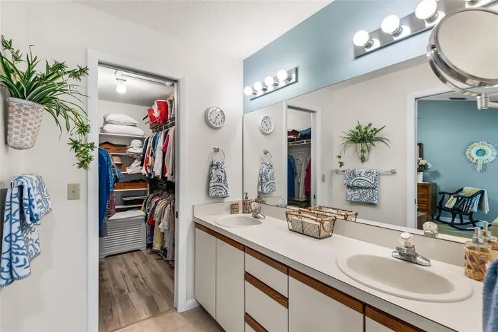 VIEW TOWARD PRIMARY BEDROOM WALK-IN CLOSET