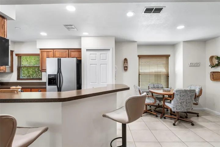 VIEW OF KITCHEN & DINING AREA
