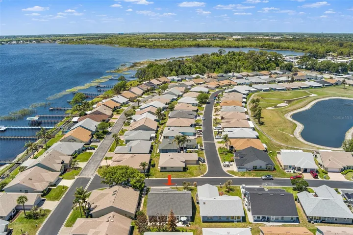 AERIAL VIEW OF HOME AND COMMUNITY