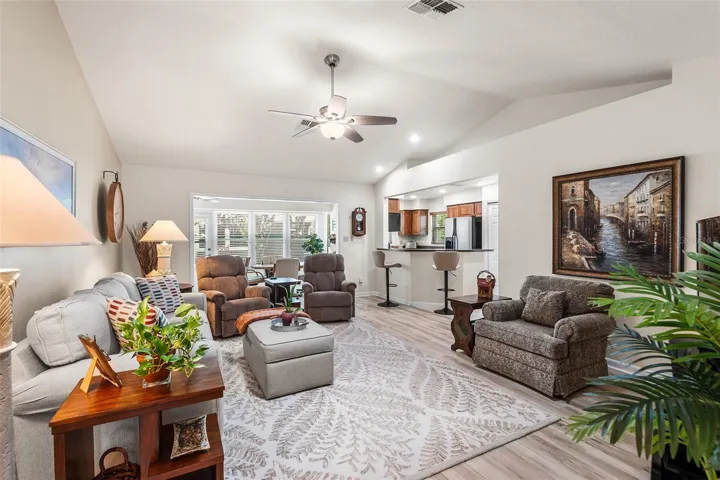 WOW! VIEW TOWARDS LIVING ROOM, KITCHEN & FLORIDA ROOM!