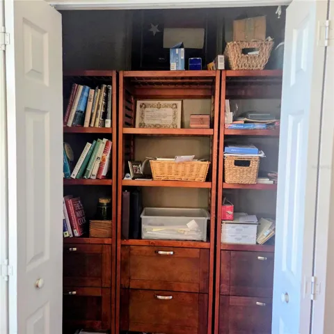 Closet in office with lots of storage