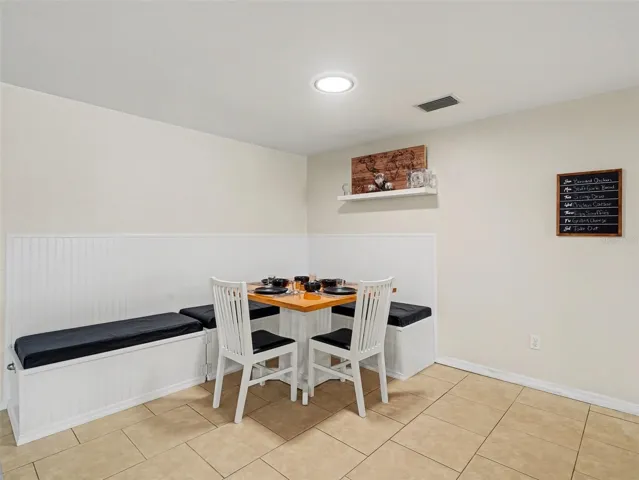 Dining area with built-in bench and storage