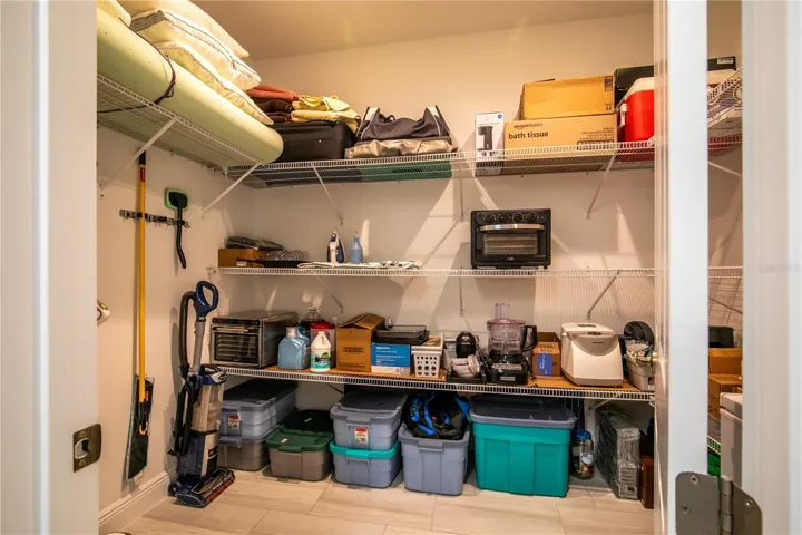 Large private storage room beyond laundry