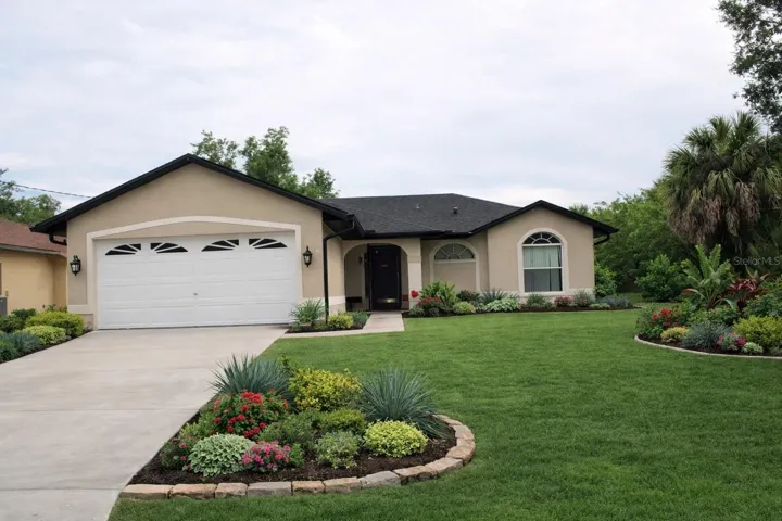 Home potential with new exterior paint and landscaping and concrete repairs