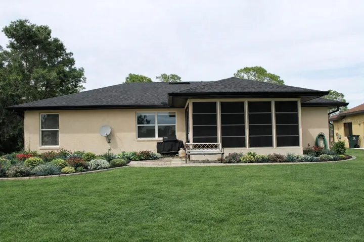 Rear of home potential with new paint, landscaping and clean up.