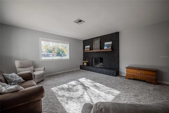 Formal Living Room with Wood-Burning Fireplace