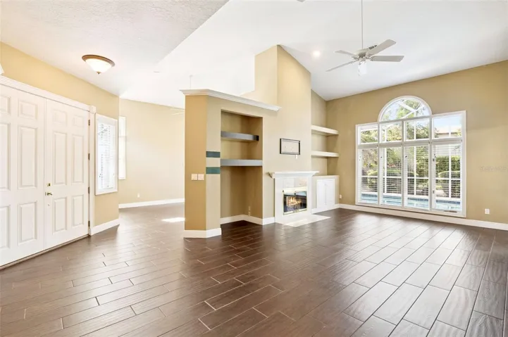 FAMILY ROOM & LIVING ROOM W/ DUAL FIREPLACE