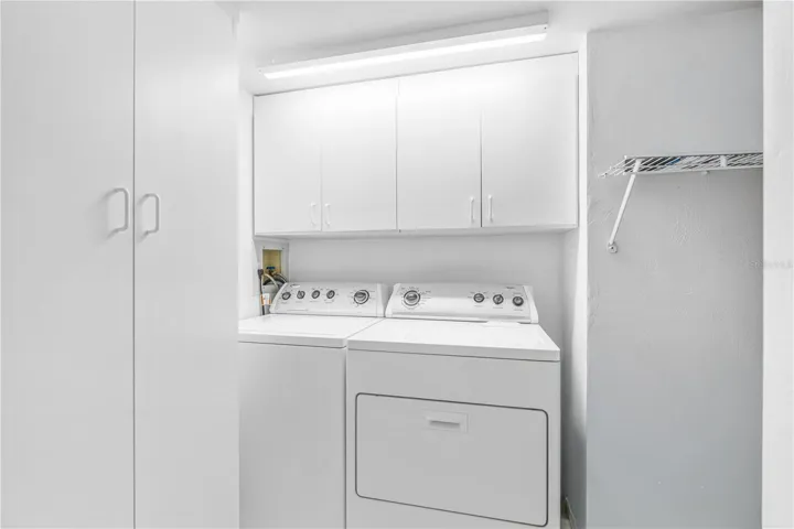 Inside Laundry with plenty of Storage