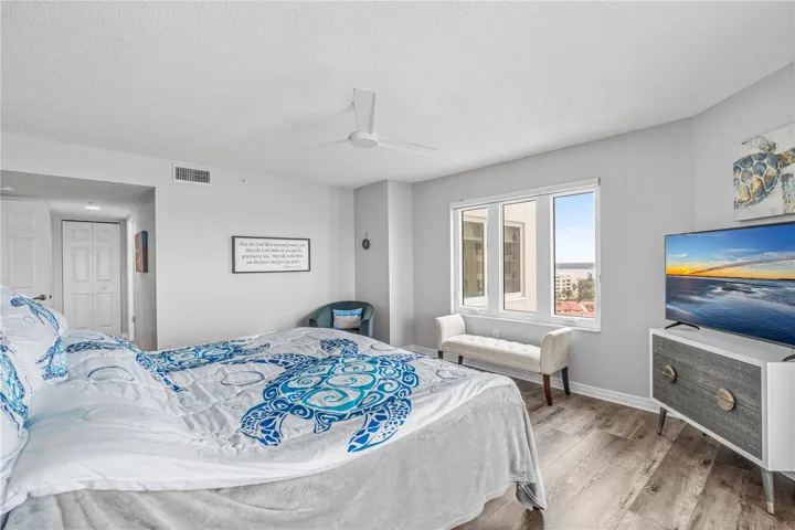 Primary Bedroom with Triple Window Views