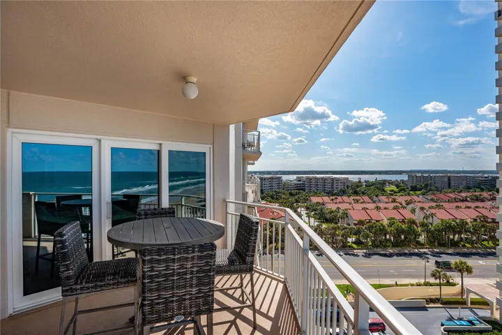 NE end of balcony w/vies of Intracoastal, sliders to primary bed