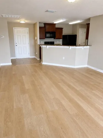 After -- Gathering area with new flooring