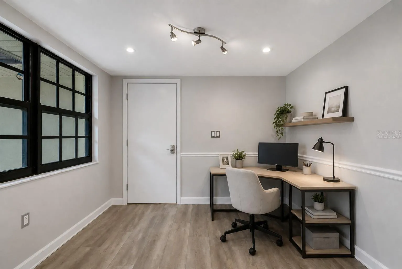 virtually staged flex area off of kitchen