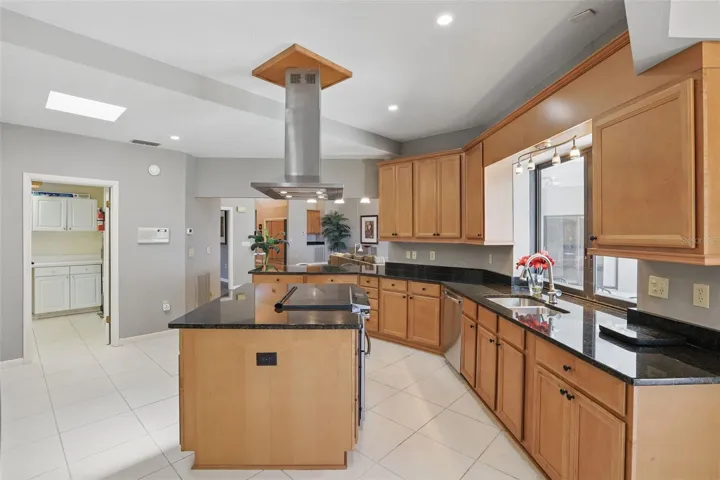 Island Kitchen - shows the laundry room