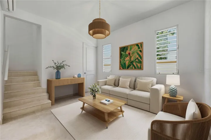 Living Room - This image has been virtually staged, including lighting fixture. The photo does not reflect the current state of the property.