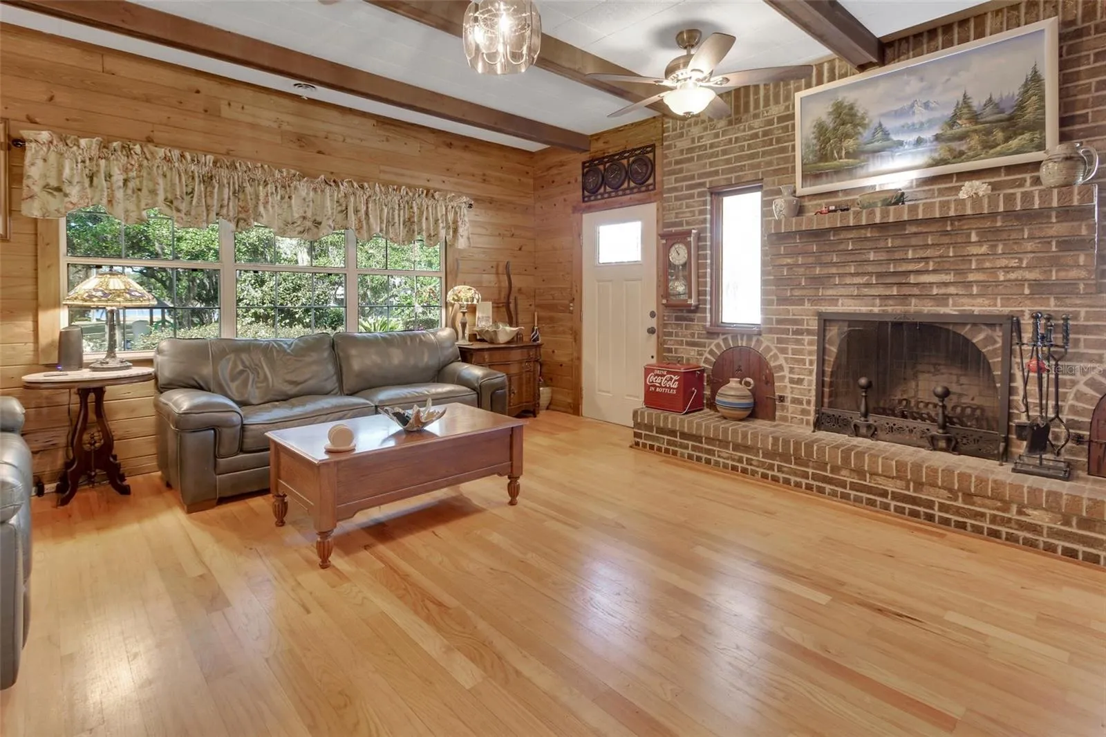 Living Room with brick fireplace