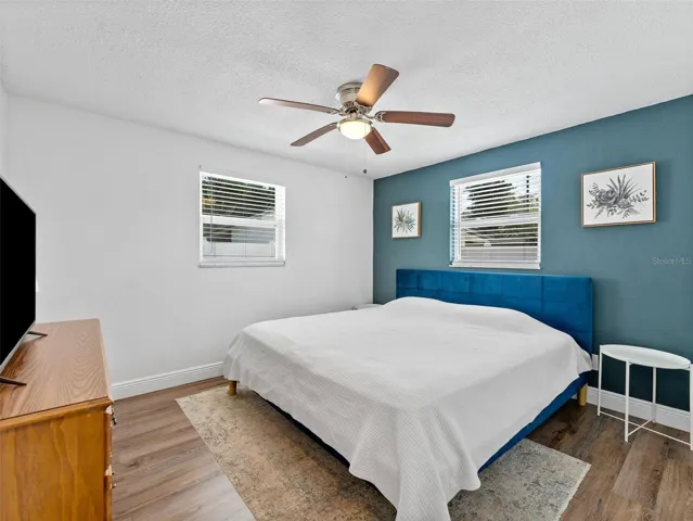 Primary bedroom with abundant natural lighting