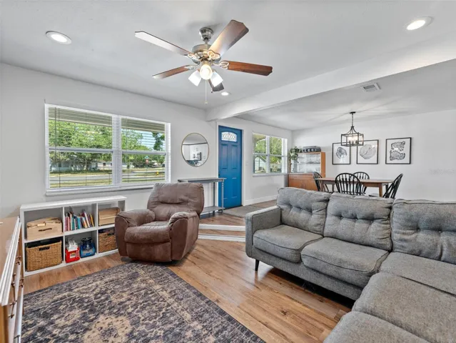Living room has a step down making it a cozy and comfortable space to relax or entertain
