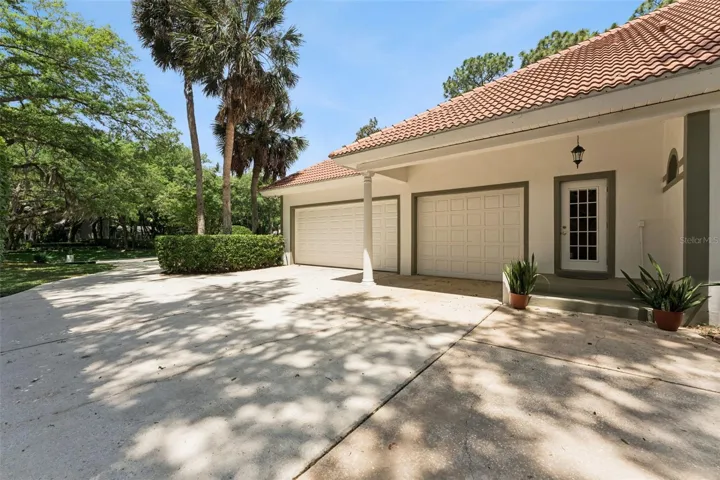 3 Car Side Entry Garage and Porch off Laundry Room.