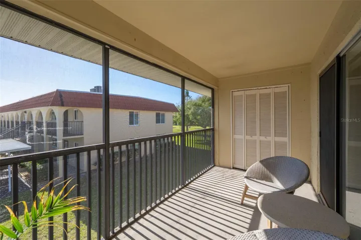 Screened balcony, seating and storage