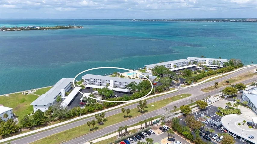 First floor unit overlooking pool and Sarasota Bay.