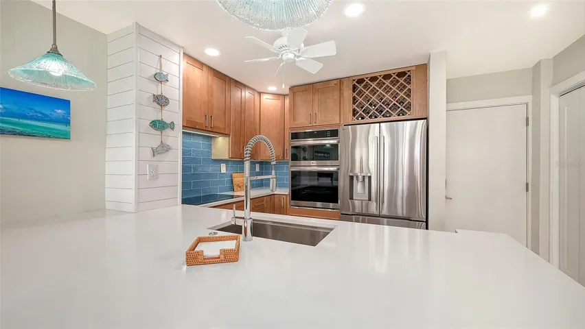 Additional special features. Cooktop, Microwave, oven, and built in wine rack.