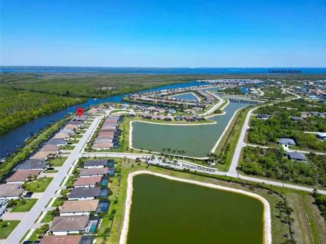 Picture with the entire community and canal to Charlotte Harbor within view.