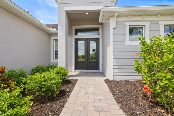 Exterior view of the front door and walkway.