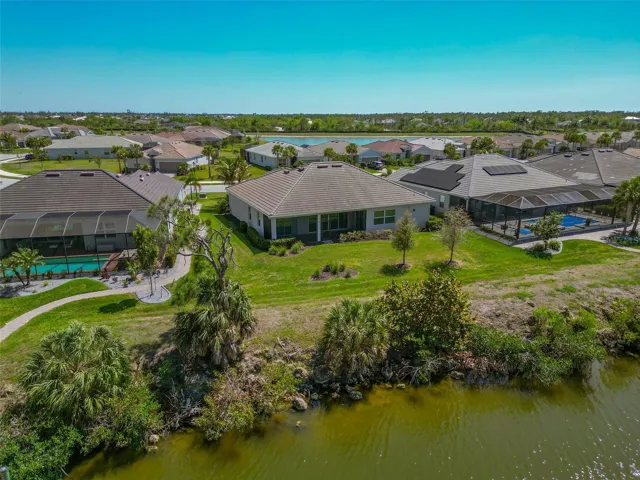 Back of home with a view of the canal.