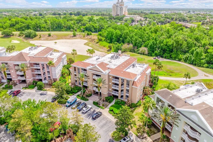 Step into elevated RESORT STYLE LIVING in the GUARD GATED Villas at Reunion Square – where GOLF COURSE VIEWS, modern upgrades, and a truly MOVE-IN READY condition come together in one exceptional second floor unit!