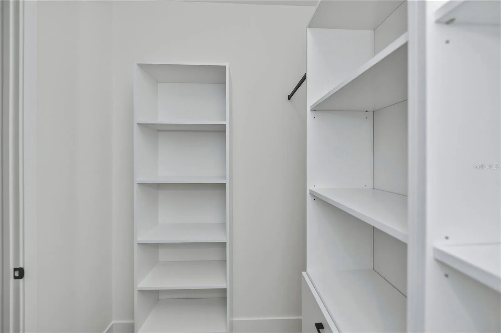 Primary Bedroom California Style Cabinety Walk in Closet