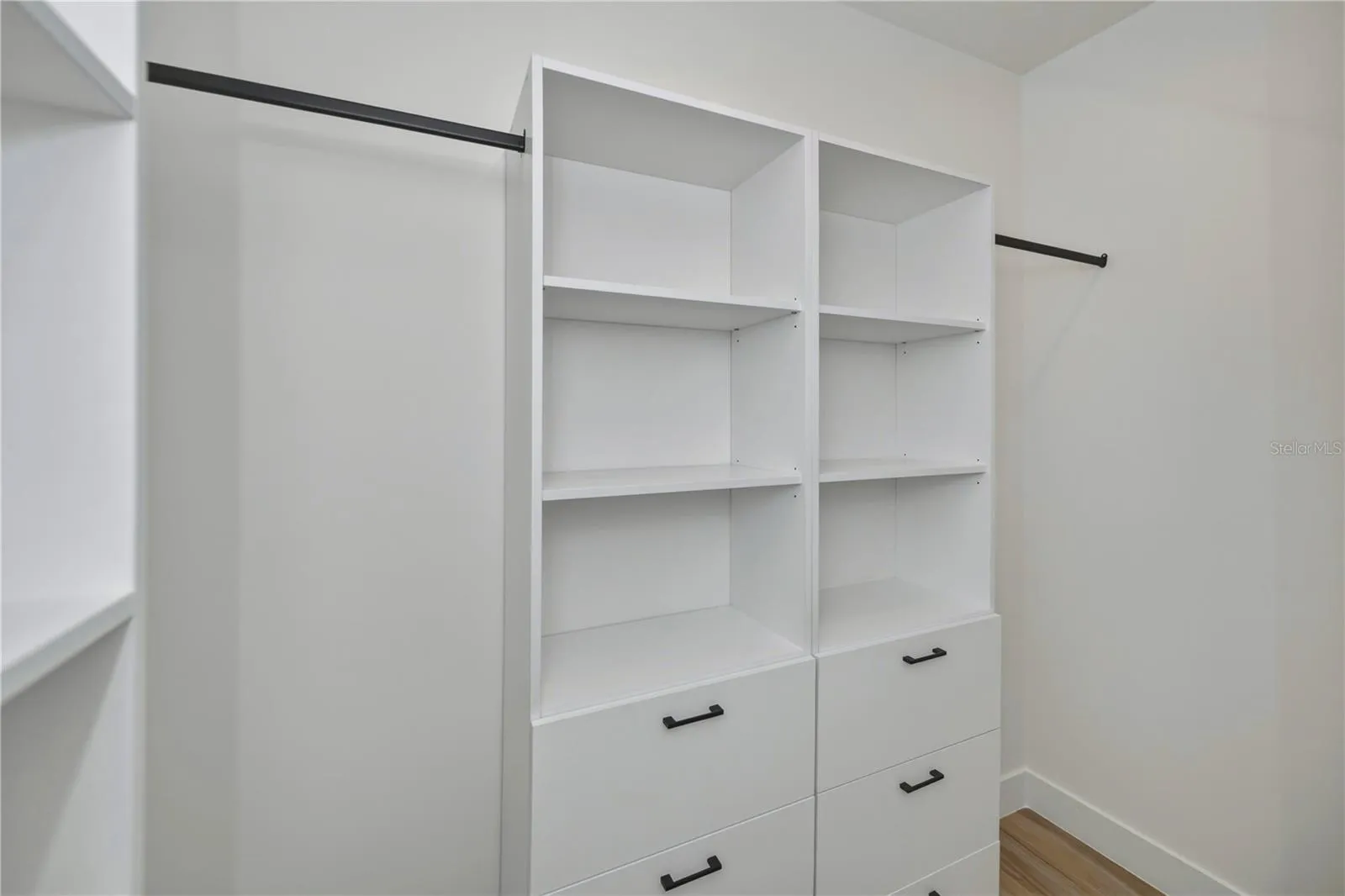 Primary Bedroom California Style Cabinety Walk in Closet