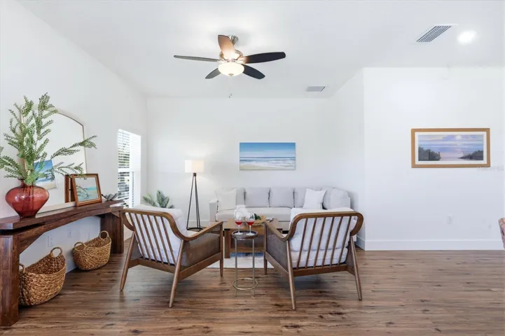 Living room open to kitchen and dining area