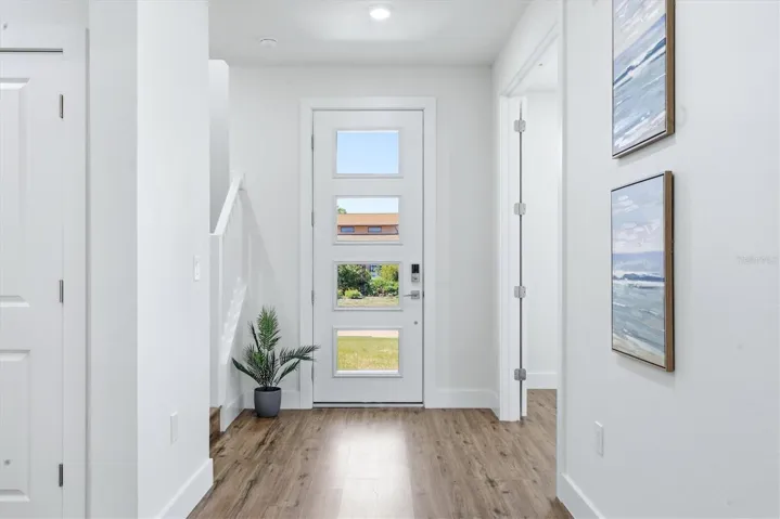 Foyer - den or extra bedroom with French doors to the right