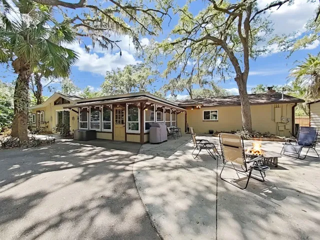 Expansive back exterior, showcasing the home's meticulous care and appeal.
