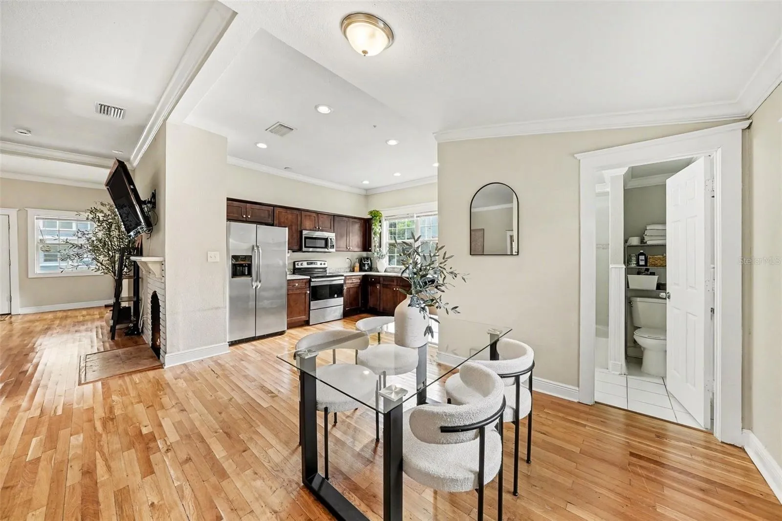 Additional view of dining area with natural flow into kitchen.