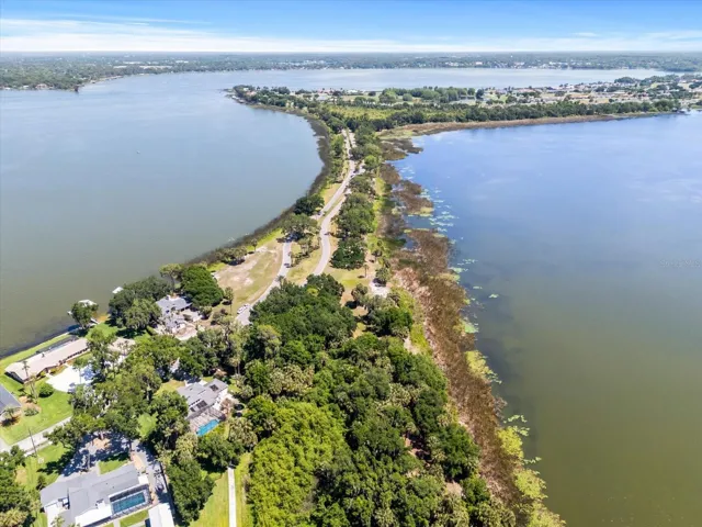 From Lake Beauclair corner of lot looking over Deer Island, Lake Beauclair on right, Lake Dora on left and downtown Mount Dora in distance (top right)