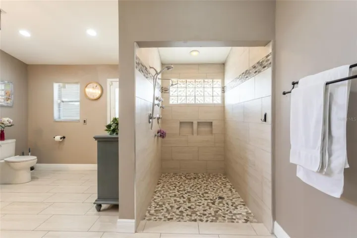 Spacious walk - in Shower.