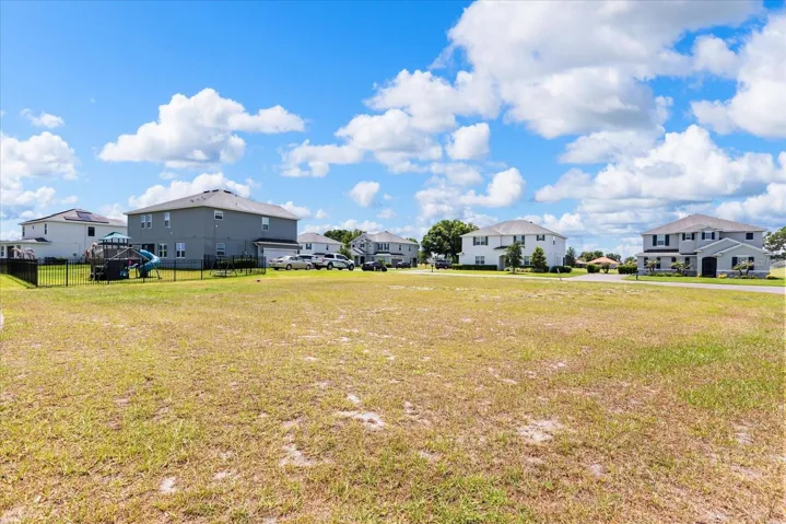 From Osprey, back corner of lot looking at Sawgrass
