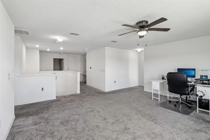 Large bonus/loft at the top of stairs.